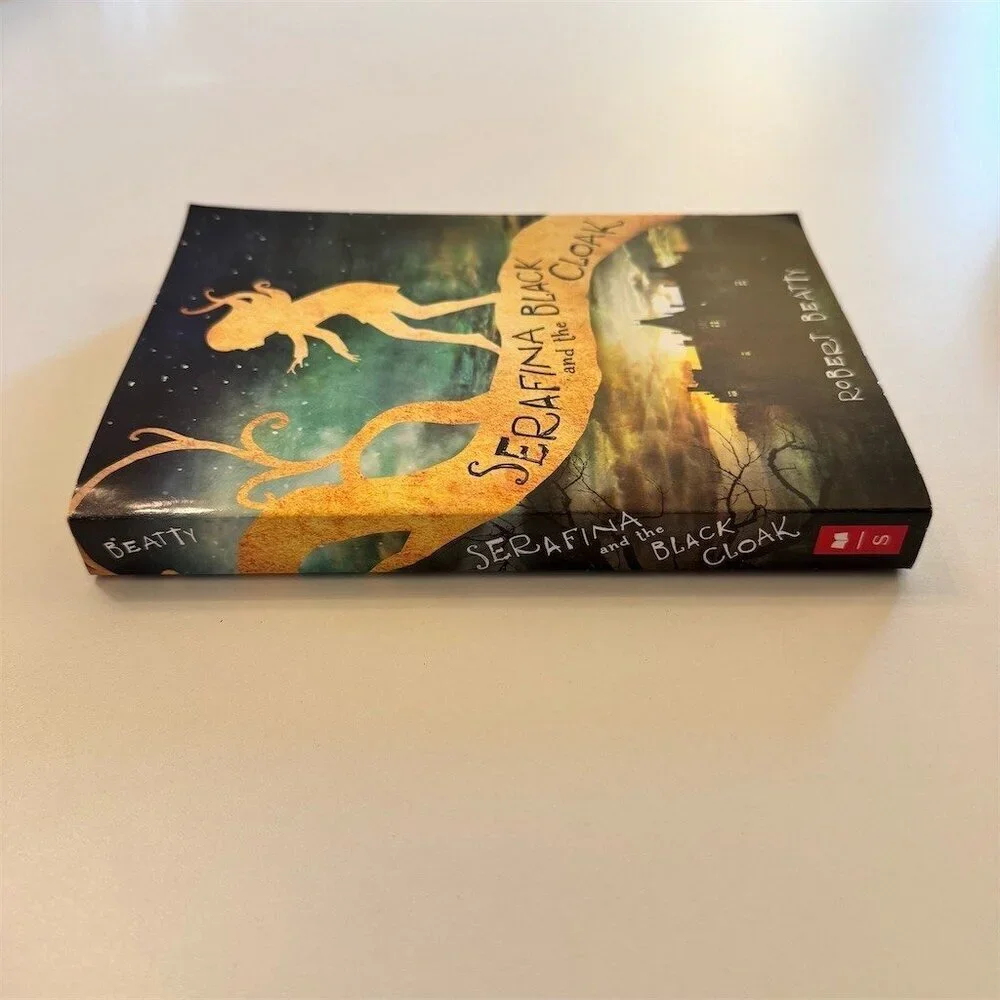 Serafina and the Black Cloak Paperback Book by Robert Beatty Scholastic